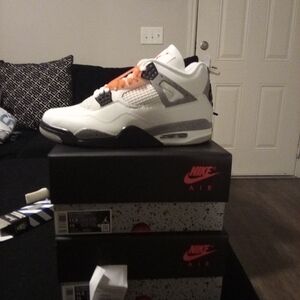 Jordan 4 White Cement White and Gray Sneakers with Orange Accents